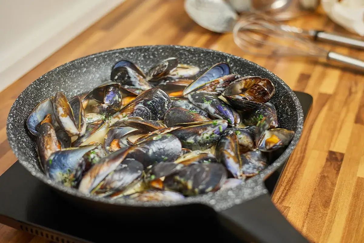 Cooking Delicious Mussels on a Stove Top